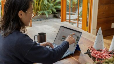 a woman using a laptop