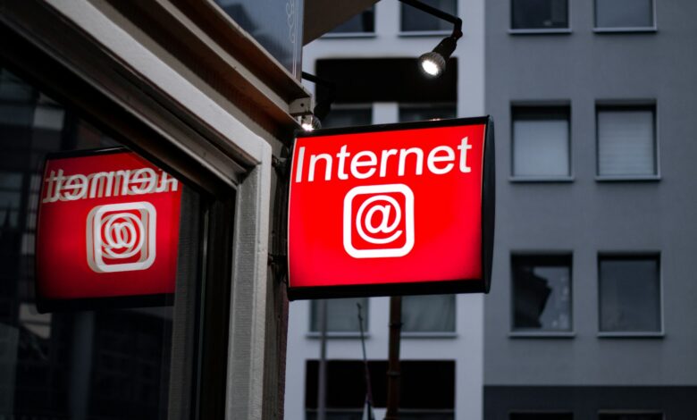 Internet LED signage beside building near buildings