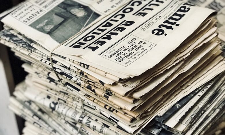 bundle of newspaper on table